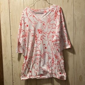 Women’s size medium shirt with raw hem cut into v-neck